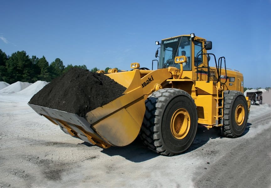 Kawasaki bulldozer with a bucket full or dirt