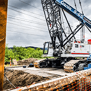 Crane Lifting Pilings